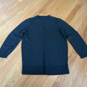 Grey turtleneck - 3/4 sleeve - slight ruching on edges - fits like a medium